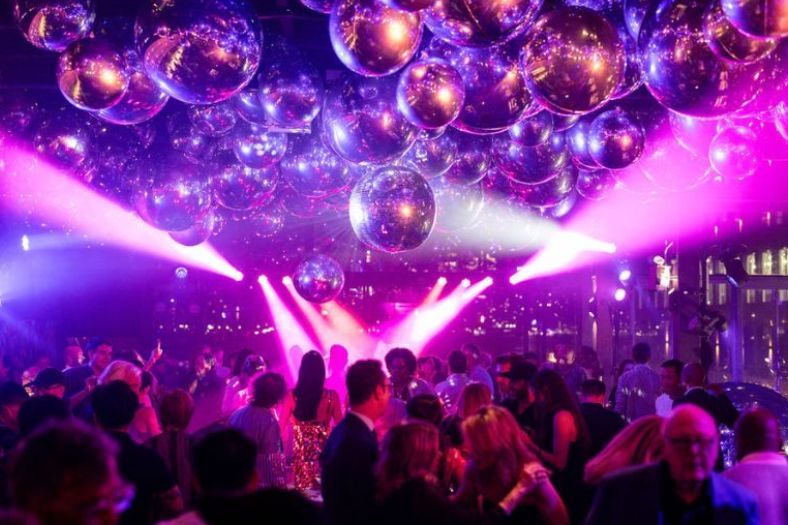 Lighting shapes intimacy at dinner, anticipation before a performance, and energy when the evening changes pace.
