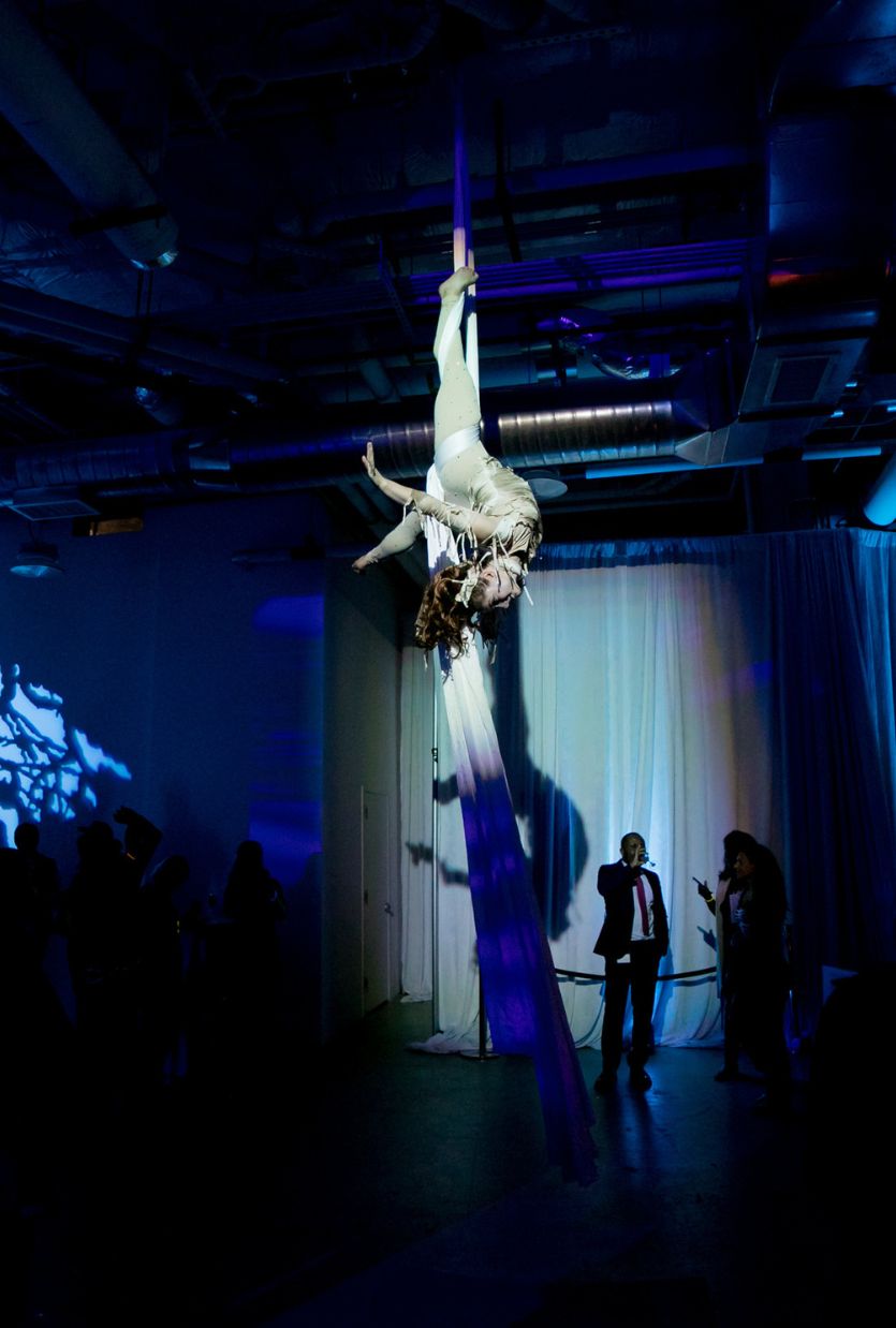 Performers move through the space. The atmosphere shifts. Guests become part of what is unfolding around them.
